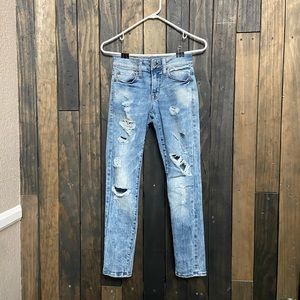 AMERICAN EAGLE RIPPED NEXT LEVEL FLEX JEANS